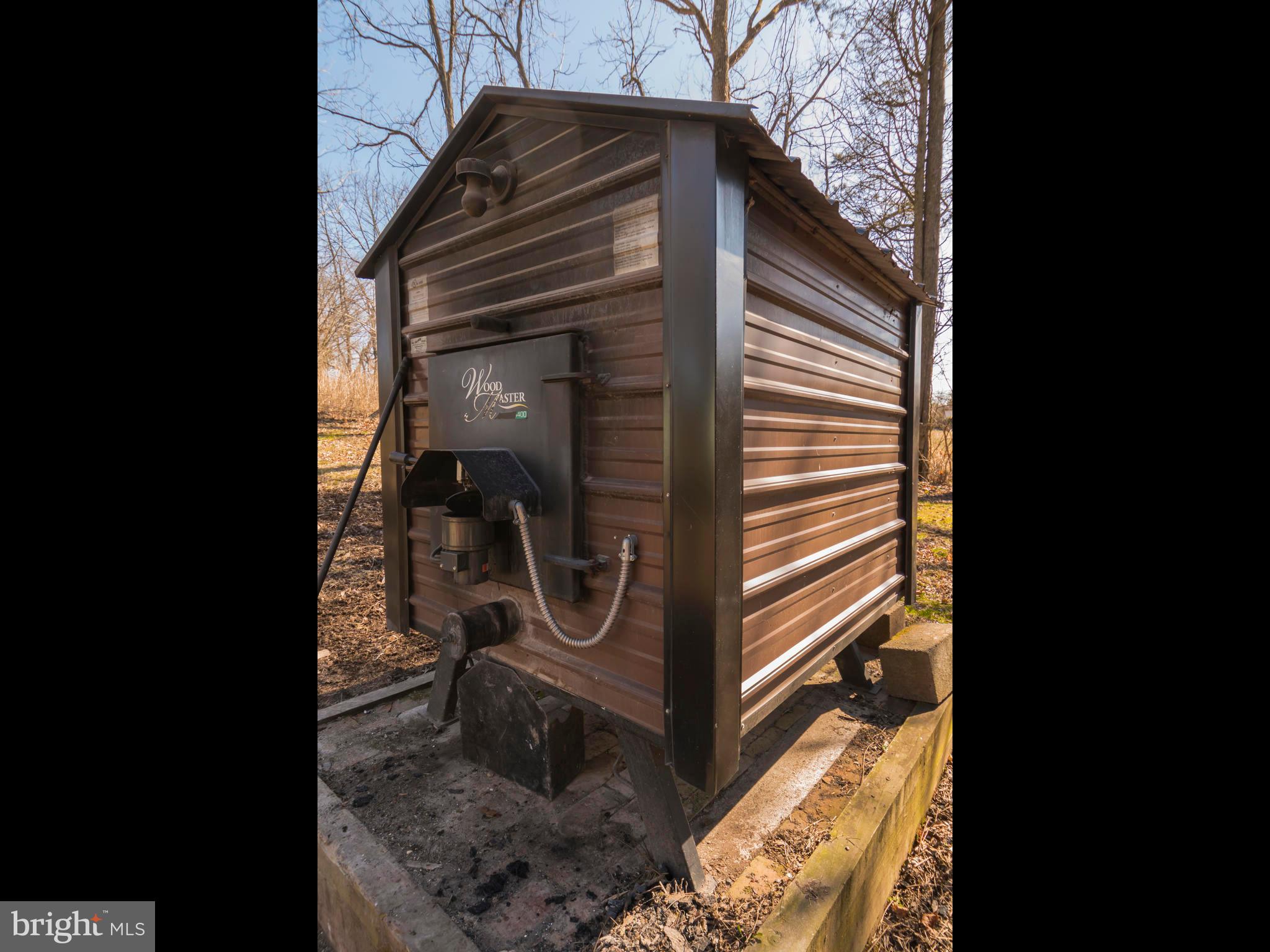 3050 Wonziegler Road Pennsburg, PA 18073 - Photo 22 of 31 Outside wood burning stove
