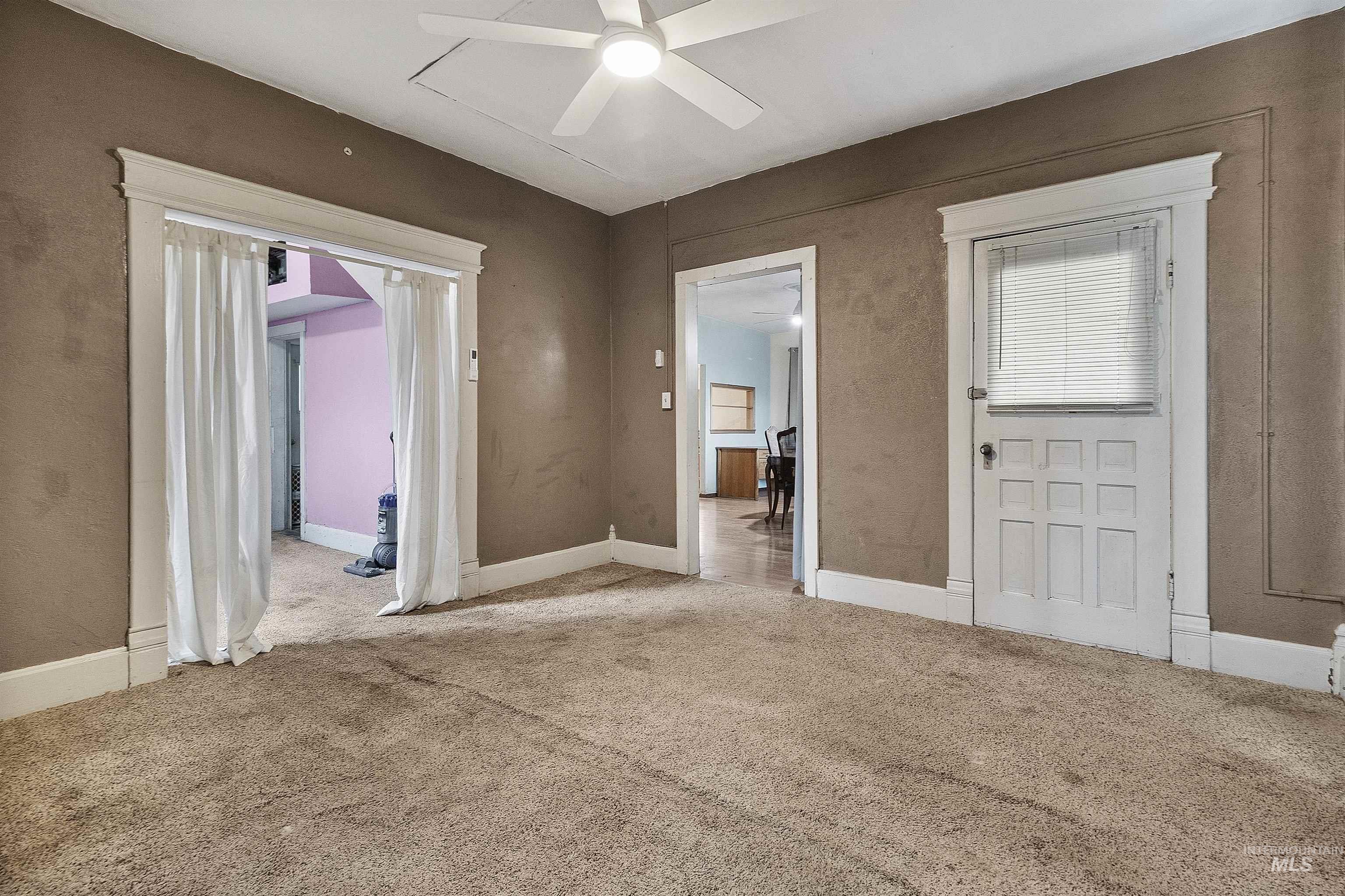 721 9th Street Clarkston, WA 99403 - Photo 27 of 39 Unfurnished bedroom with carpet flooring and ceiling fan