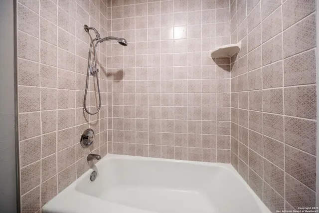 a bathroom with a bathtub