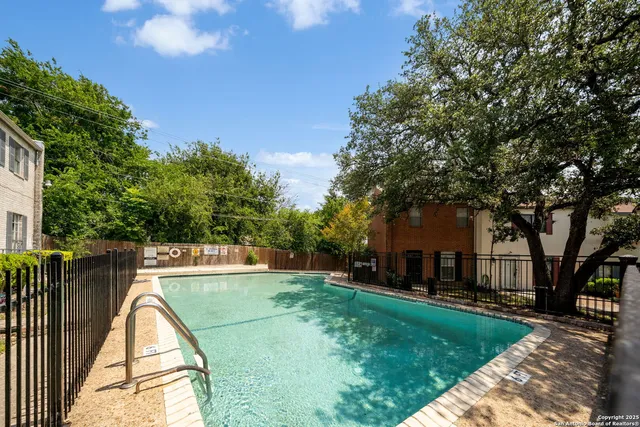 a view of backyard with green space
