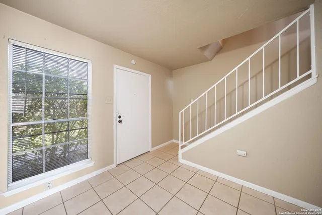 a view of an entryway with a window