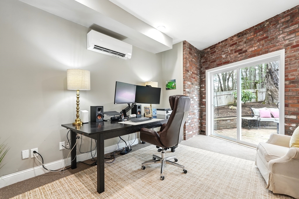 249 Concord Road Longmeadow, MA 01106 - Photo 16 of 41 a view of a workspace with furniture and a window