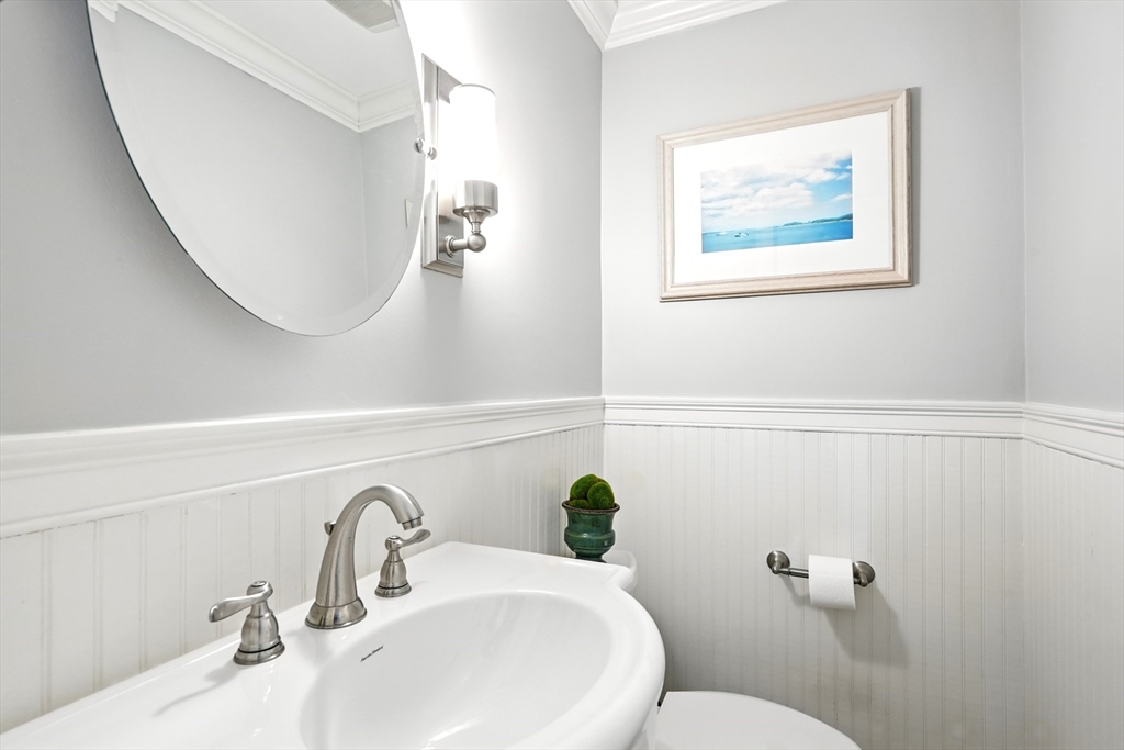 249 Concord Road Longmeadow, MA 01106 - Photo 18 of 41 a bathroom with a toilet sink and mirror