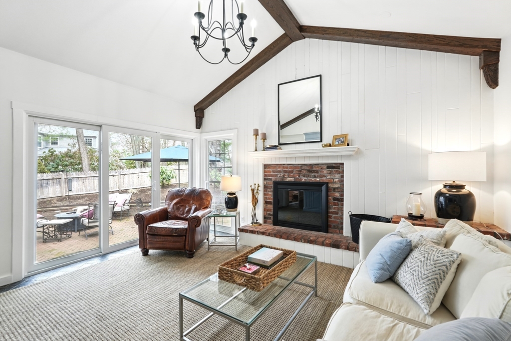 249 Concord Road Longmeadow, MA 01106 - Photo 19 of 41 a living room with furniture and a fireplace