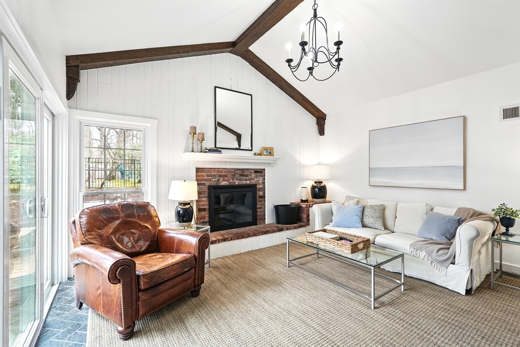 249 Concord Road Longmeadow, MA 01106 - Photo 20 of 41 a living room with furniture and a fireplace