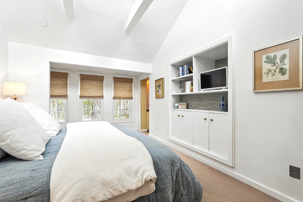 249 Concord Road Longmeadow, MA 01106 - Photo 24 of 41 a spacious bedroom with a bed and cabinet