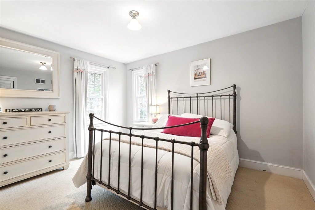 249 Concord Road Longmeadow, MA 01106 - Photo 29 of 41 a view of a bedroom with furniture and windows