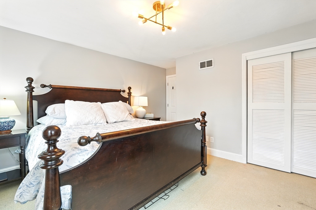 249 Concord Road Longmeadow, MA 01106 - Photo 33 of 41 a bed room with a bed and a window