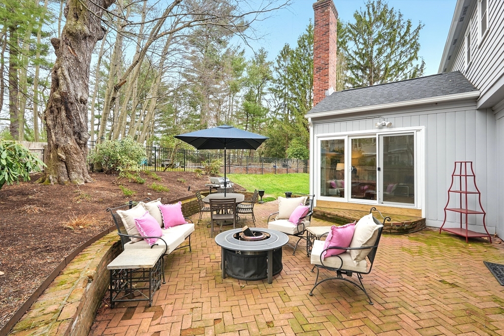 249 Concord Road Longmeadow, MA 01106 - Photo 35 of 41 a view of a patio with couches table and chairs and potted plants