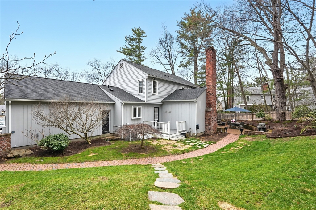 249 Concord Road Longmeadow, MA 01106 - Photo 36 of 41 a front view of a house with garden and sitting area