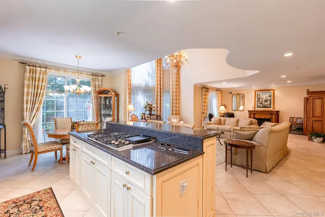 a kitchen with a table and chairs
