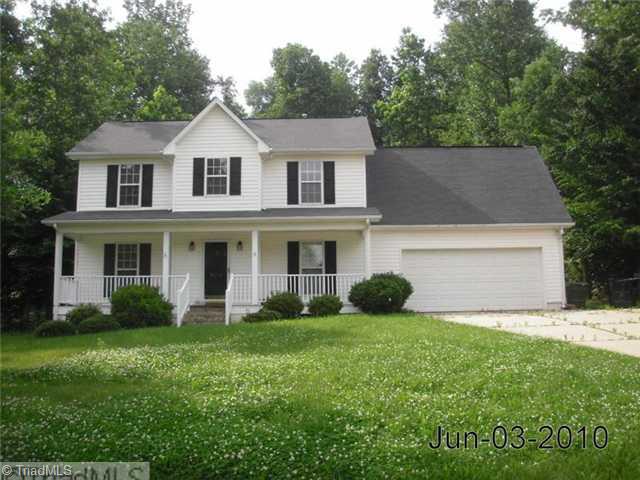 8010 Bartonshire Drive Oak Ridge, NC 27310 - Photo 1 of 2 Exterior Front.