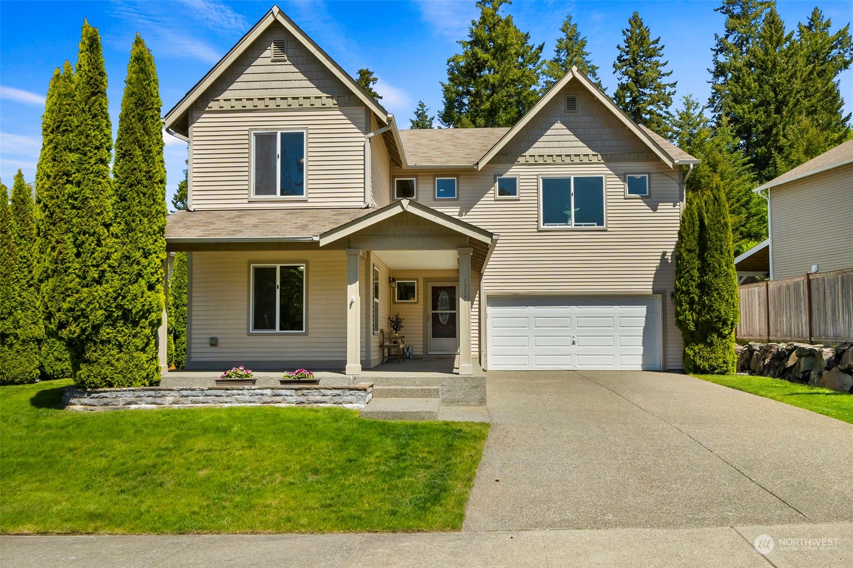 1332 Foreman Road DuPont, WA 98327 - Photo 1 of 32 a front view of a house with a yard