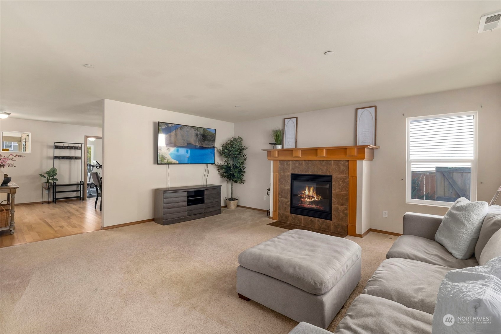 1332 Foreman Road DuPont, WA 98327 - Photo 15 of 32 a living room with furniture and a fireplace