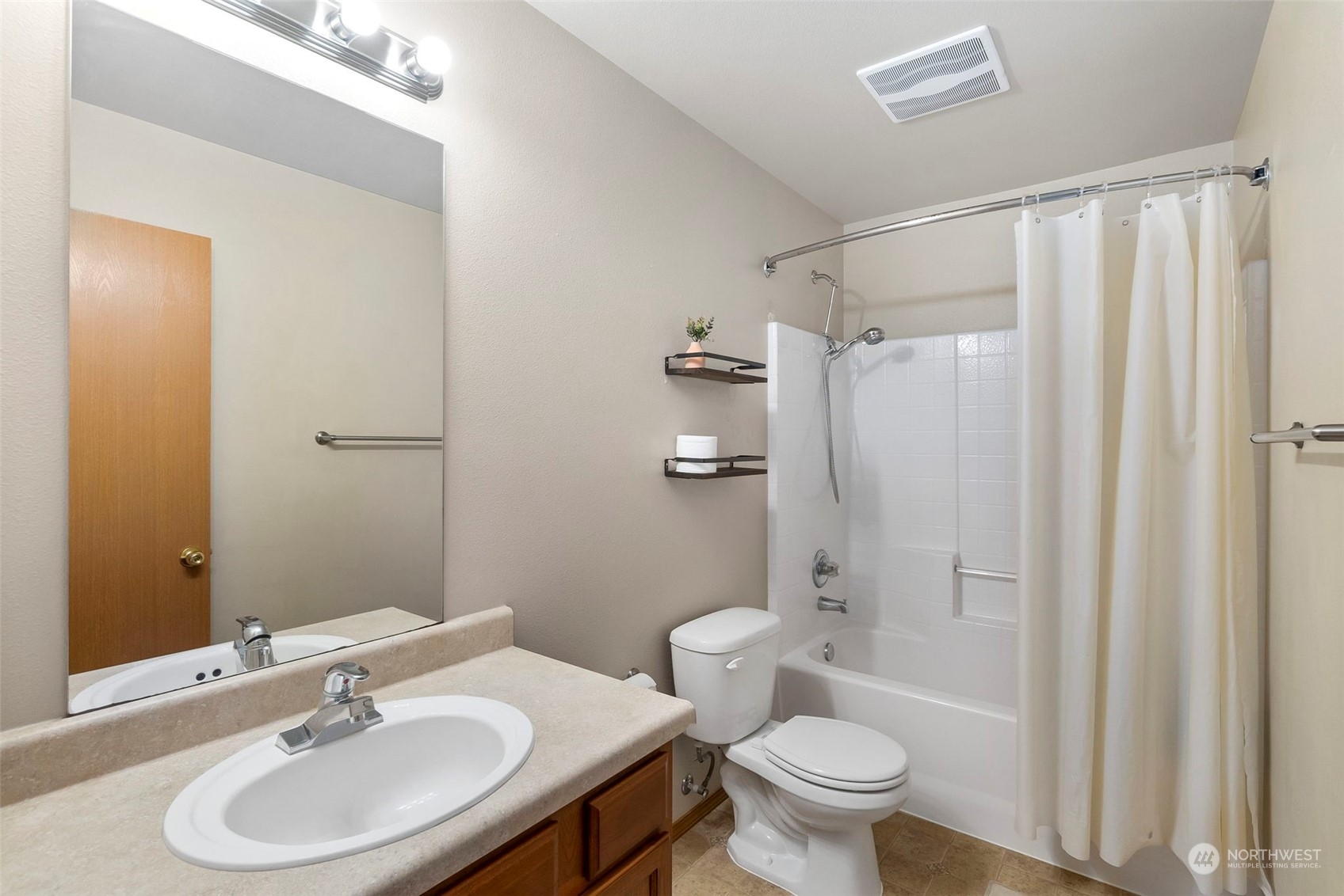 1332 Foreman Road DuPont, WA 98327 - Photo 21 of 32 a bathroom with a sink toilet and shower
