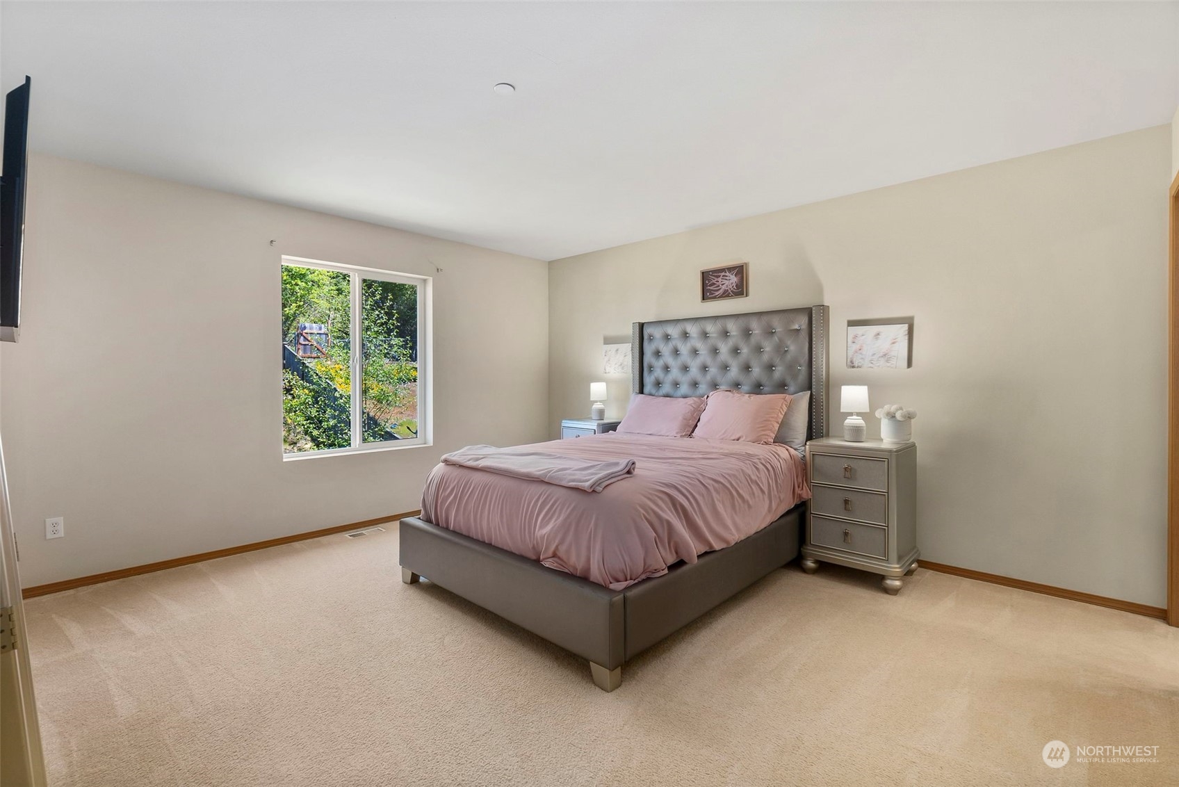 1332 Foreman Road DuPont, WA 98327 - Photo 22 of 32 a spacious bedroom with a bed and a window