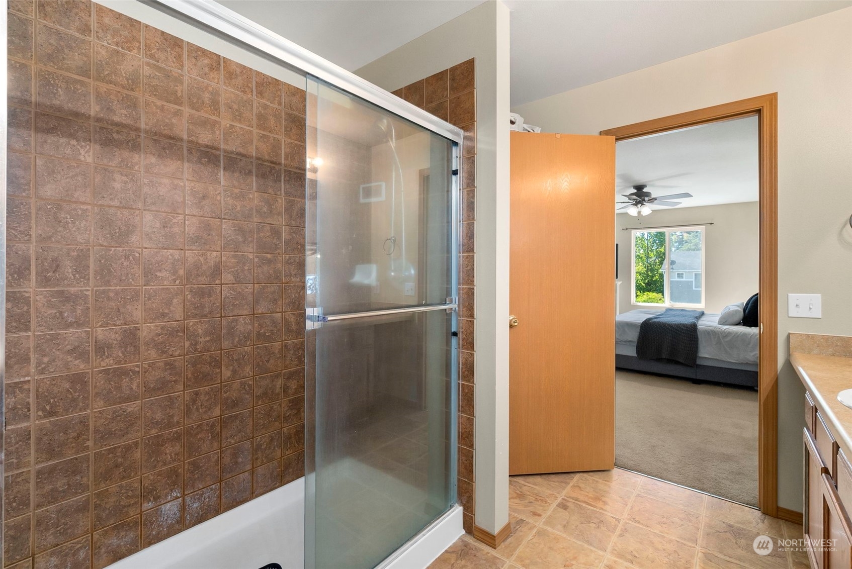 1332 Foreman Road DuPont, WA 98327 - Photo 26 of 32 a en suite bathroom with a shower