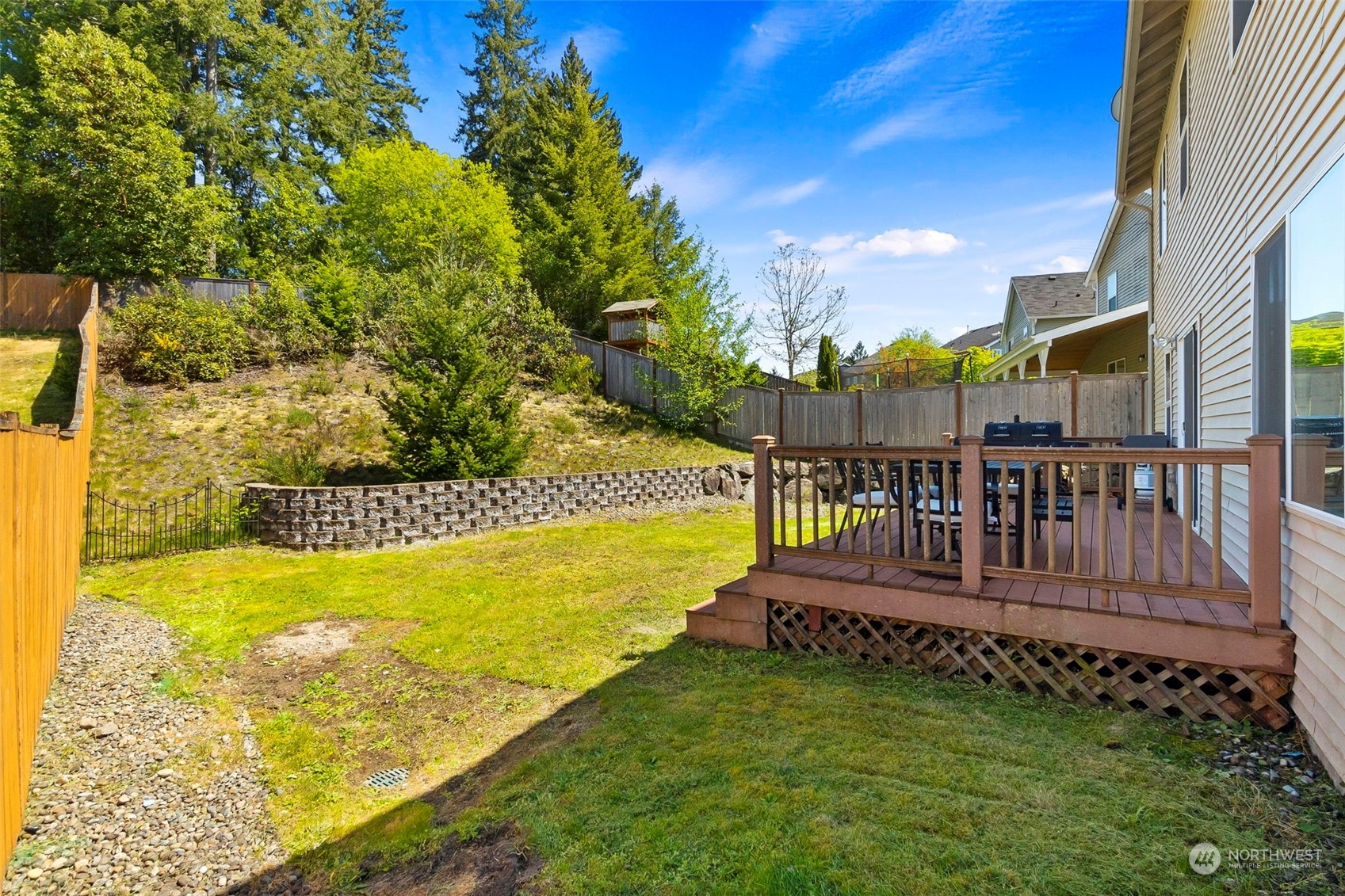 1332 Foreman Road DuPont, WA 98327 - Photo 28 of 32 a view of a swimming pool with a garden
