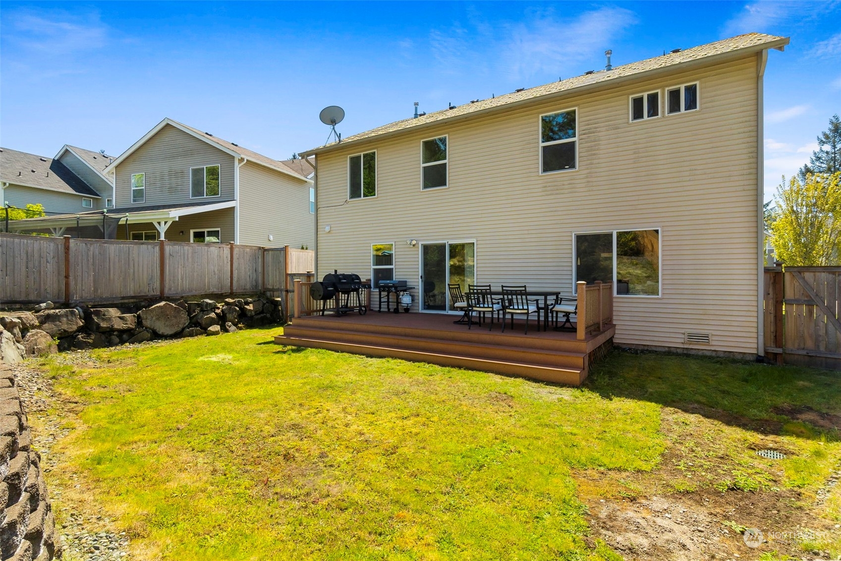 1332 Foreman Road DuPont, WA 98327 - Photo 30 of 32 a view of swimming pool with outdoor seating and a yard