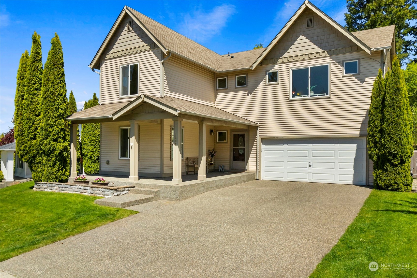 1332 Foreman Road DuPont, WA 98327 - Photo 3 of 32 a front view of a house with a yard