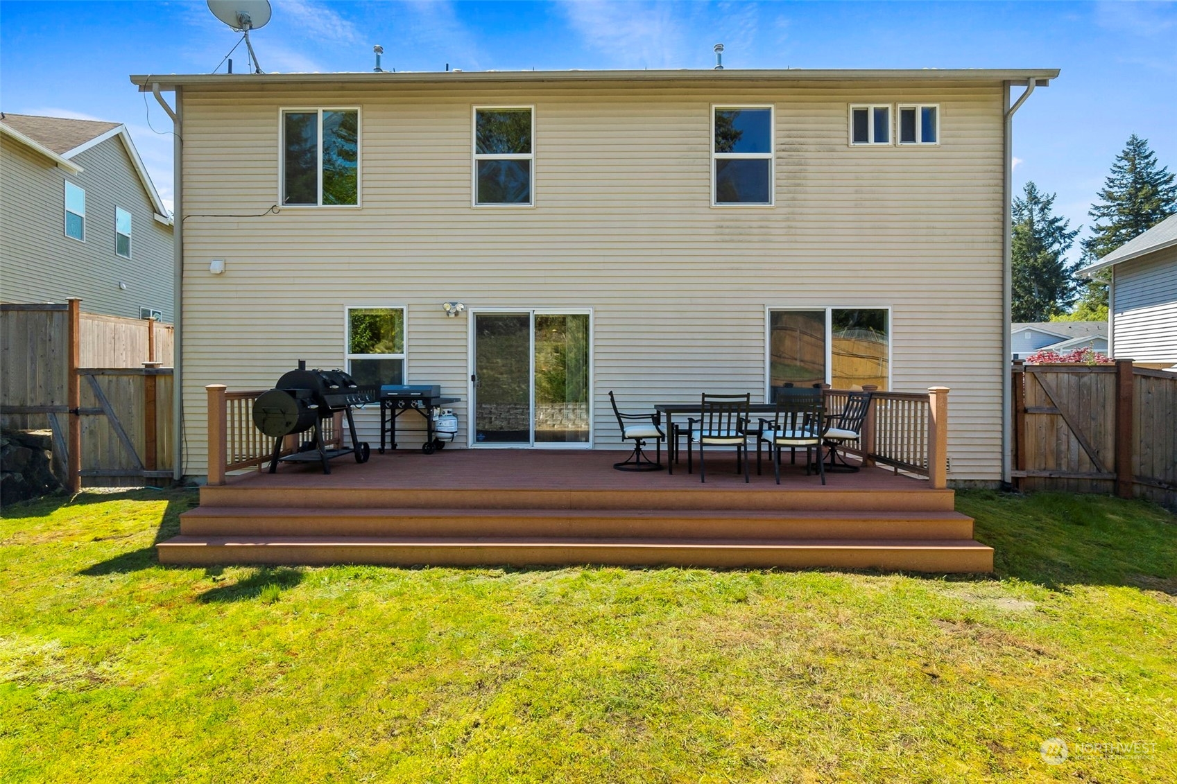 1332 Foreman Road DuPont, WA 98327 - Photo 31 of 32 a view of a house with a swimming pool
