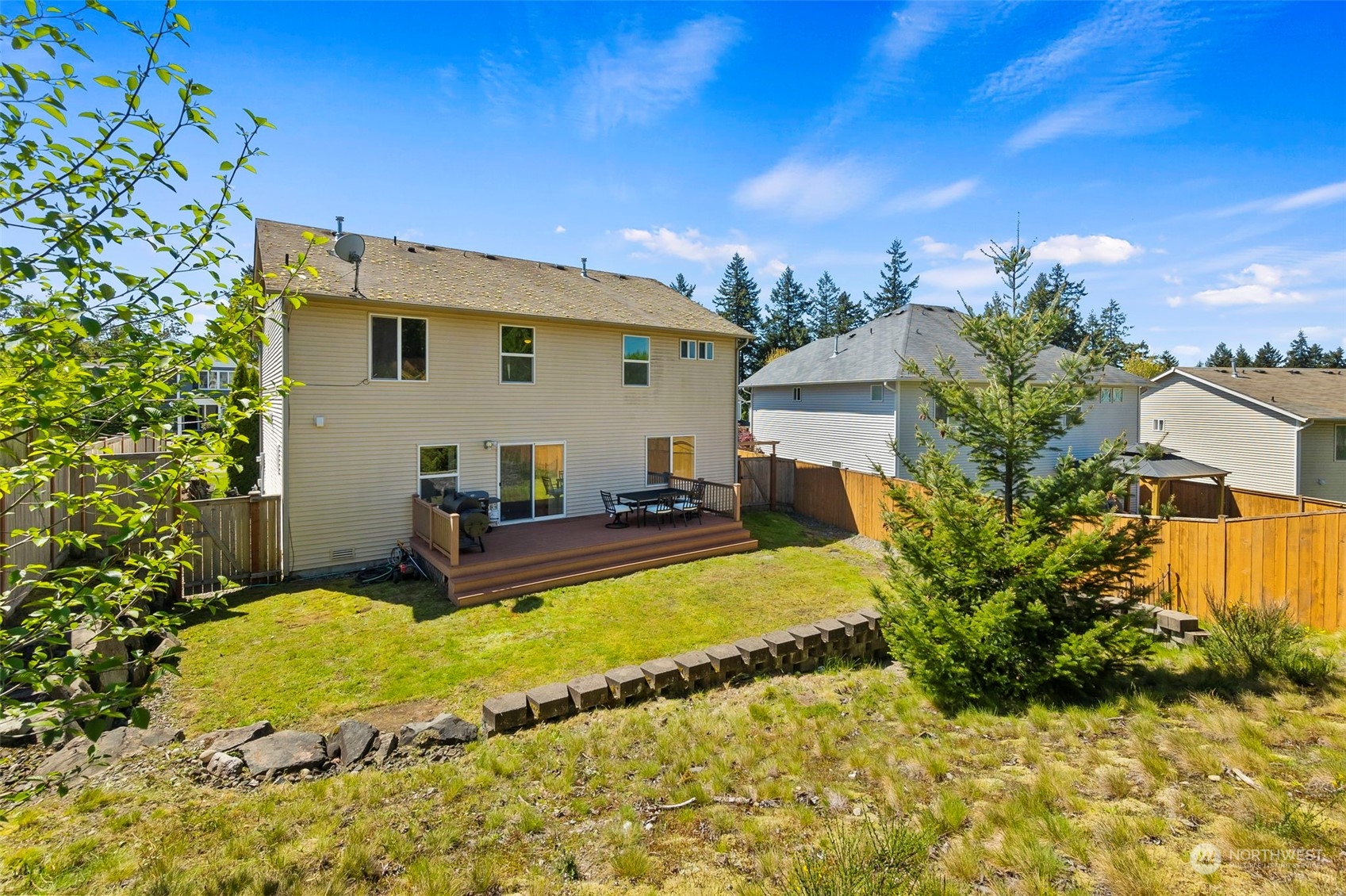 1332 Foreman Road DuPont, WA 98327 - Photo 32 of 32 a view of a house with a yard