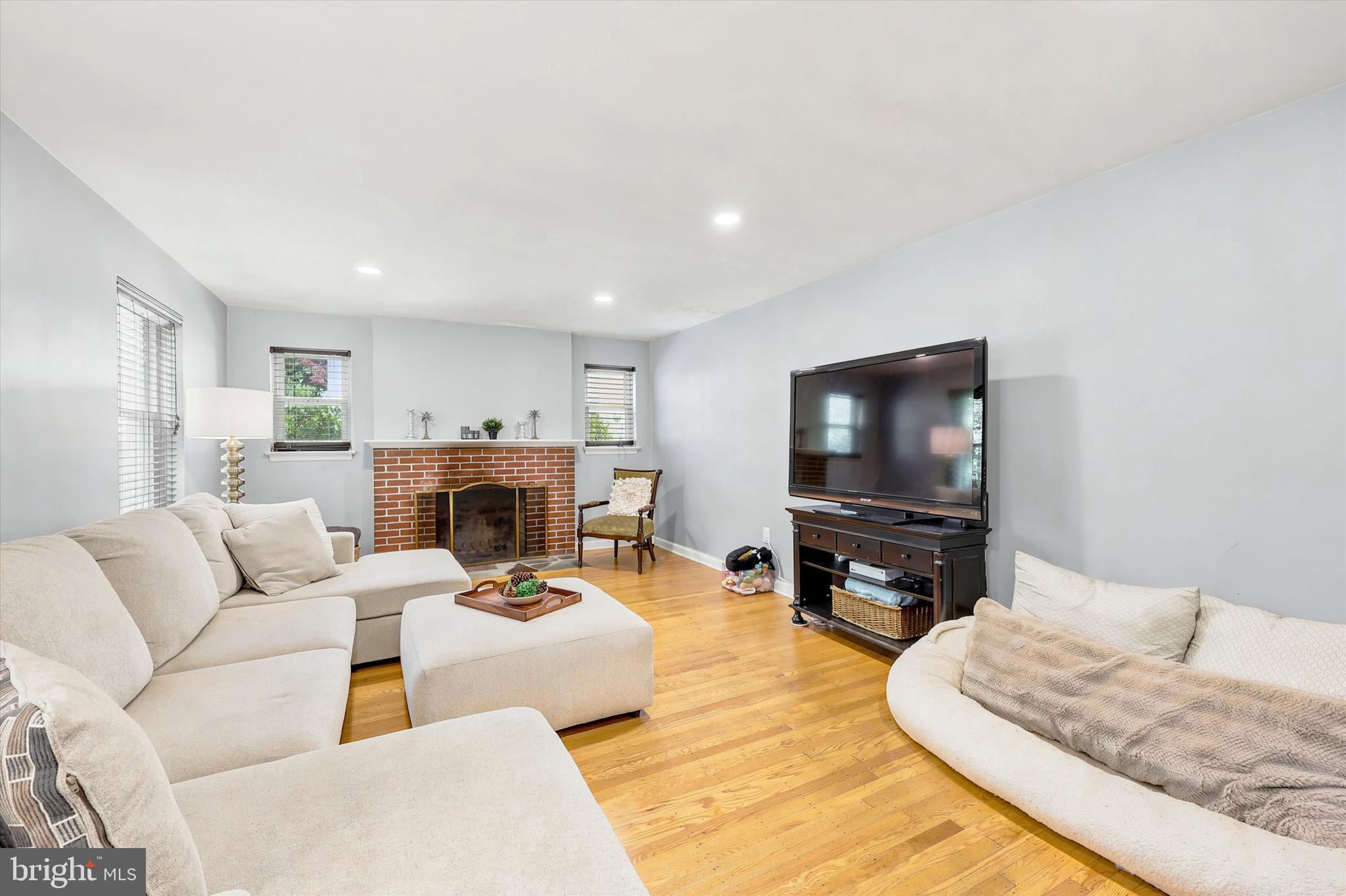 39 Haverford Road Ardmore, PA 19003 - Photo 4 of 24 a living room with furniture and a flat screen tv