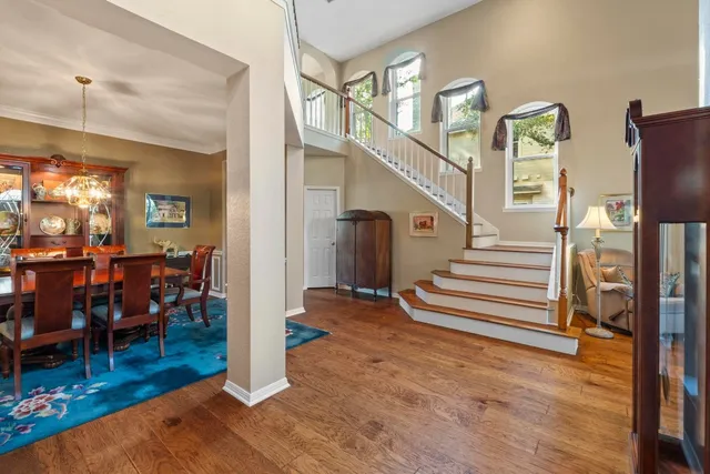 a view of entryway and hall with dining room
