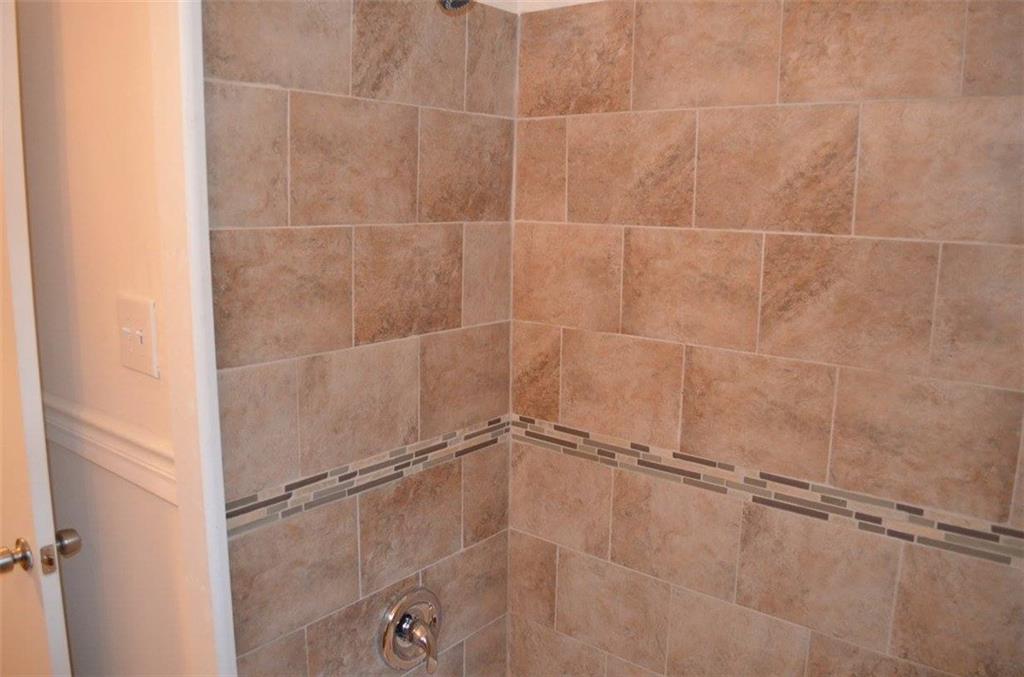 1329 Westridge Road Southwest Atlanta, GA 30311 - Photo 39 of 54 a bathroom with a shower