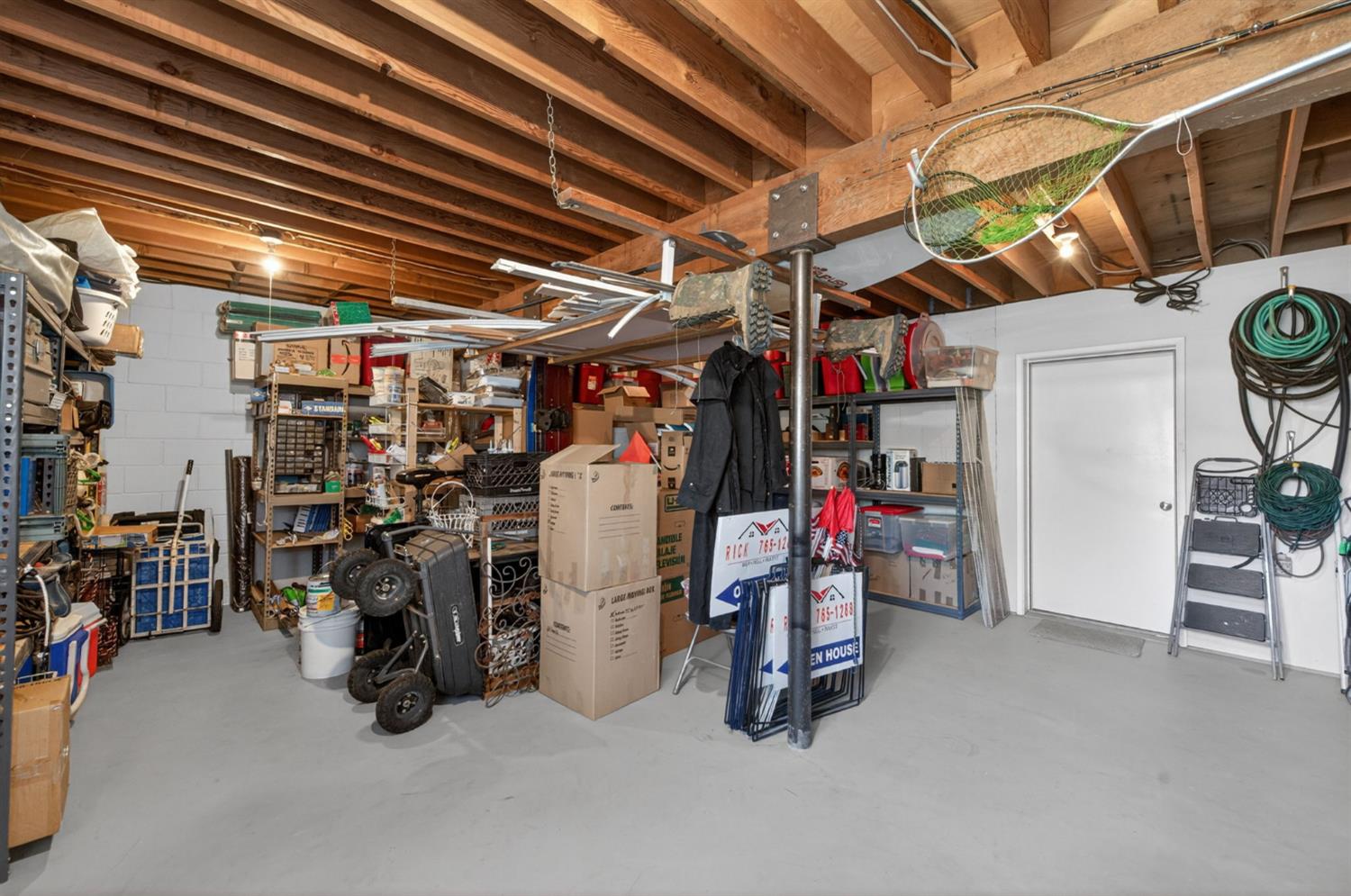 28037 Sky Harbour Road Friant, CA 93626 - Photo 22 of 40 a view of storage and utility room