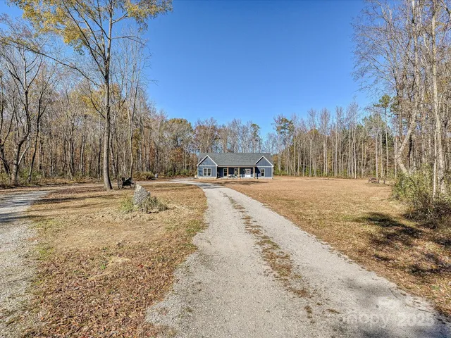 a view of road with snow on the road