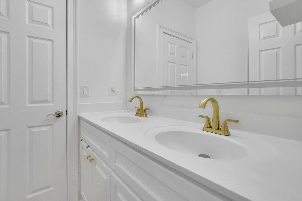 100 Trowbridge Road Atlanta, GA 30350 - Photo 27 of 49 a bathroom with a sink and a window