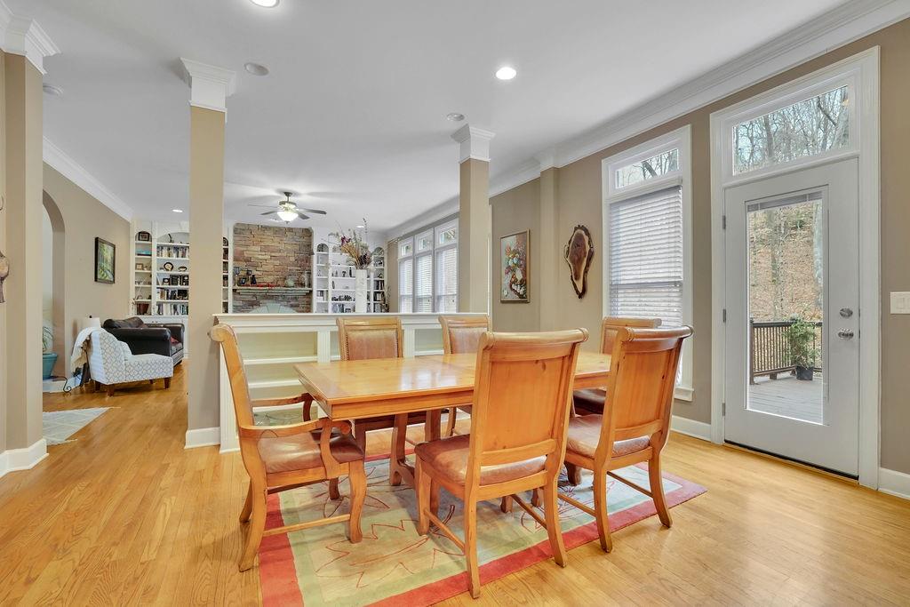 100 Trowbridge Road Atlanta, GA 30350 - Photo 10 of 42 a dining room with furniture and wooden floor