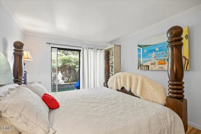 a bathroom with a toilet a sink and a mirror