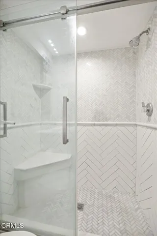 a backyard of a house with outdoor seating