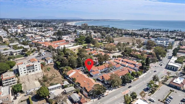 an aerial view of residential house with an outdoor space
