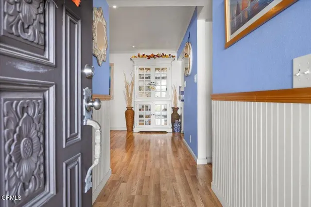 a view of walk in closet with clothes