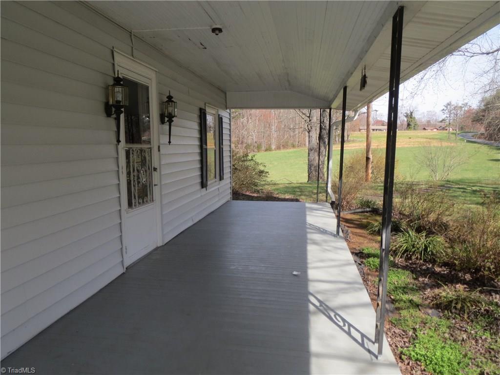 207 Ebenezer Church Road State Road, NC 28676 - Photo 3 of 30 Covered front porch perfect for rocking chairs.