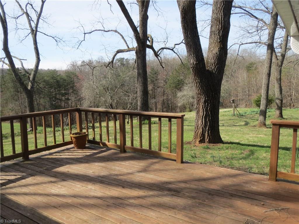 207 Ebenezer Church Road State Road, NC 28676 - Photo 21 of 30 Deck overlooking grounds and 10 acres of land.