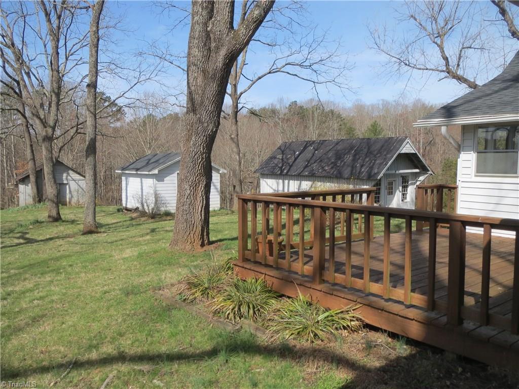 207 Ebenezer Church Road State Road, NC 28676 - Photo 4 of 30 Property features 3 outbuildings.