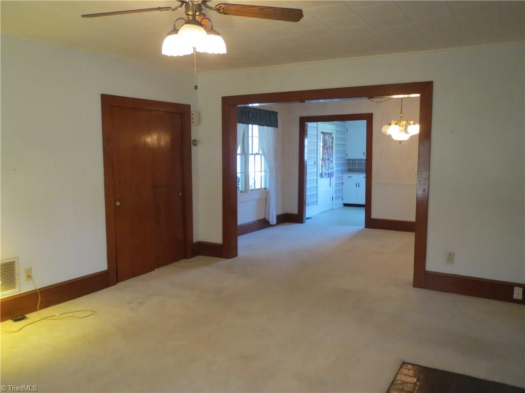 207 Ebenezer Church Road State Road, NC 28676 - Photo 30 of 30 Family room opens to dining room which opens to the kitchen for a nice open floor plan.