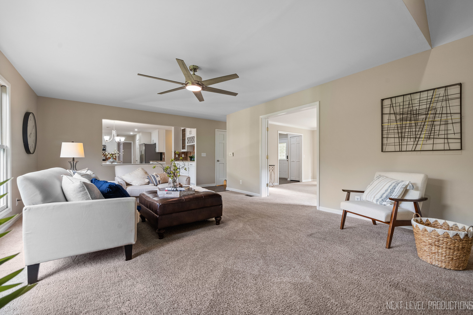 24 River Bend Road Montgomery, IL 60538 - Photo 12 of 36 a living room with furniture and a large window
