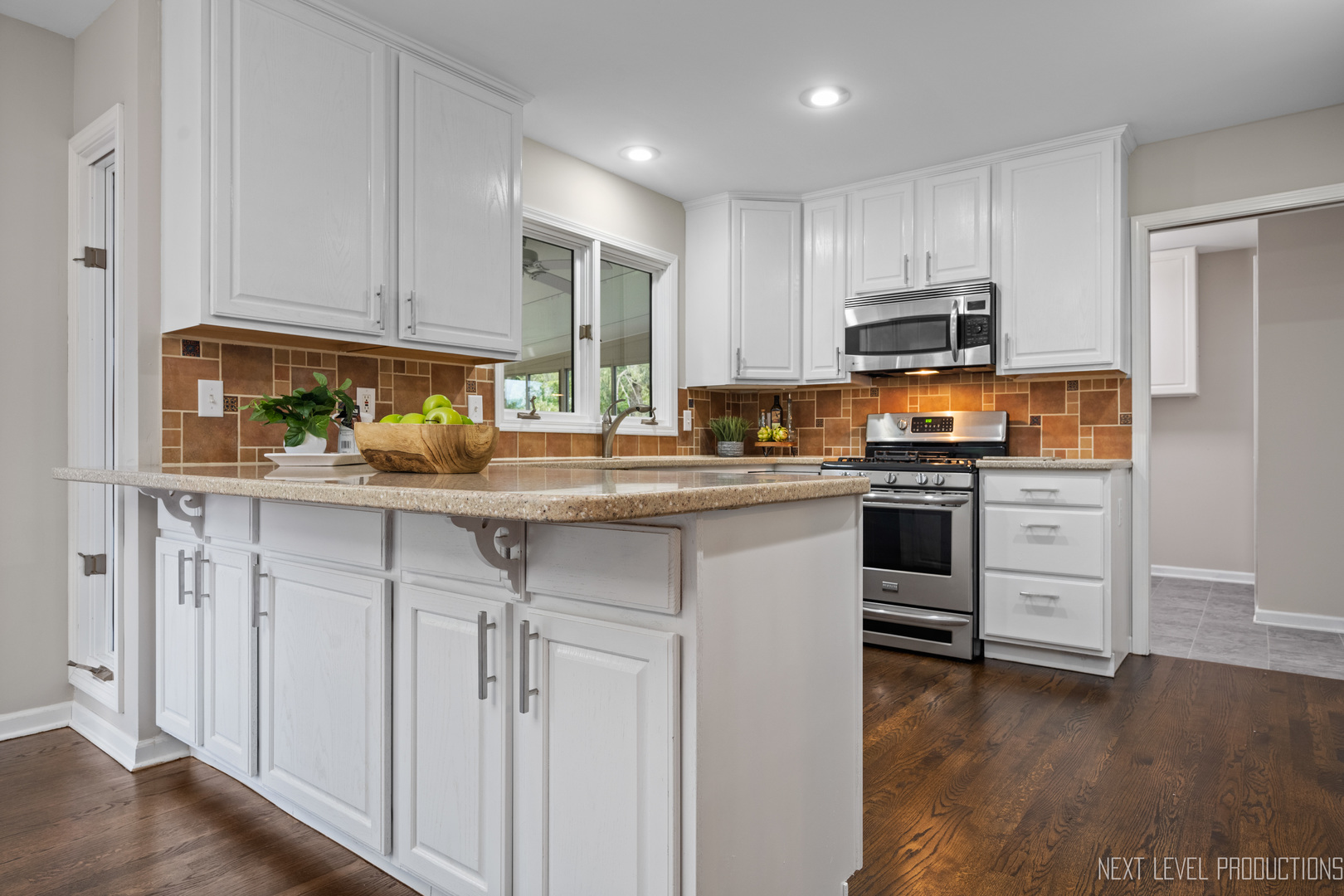 24 River Bend Road Montgomery, IL 60538 - Photo 15 of 36 a kitchen with stainless steel appliances granite countertop a stove a sink and a refrigerator