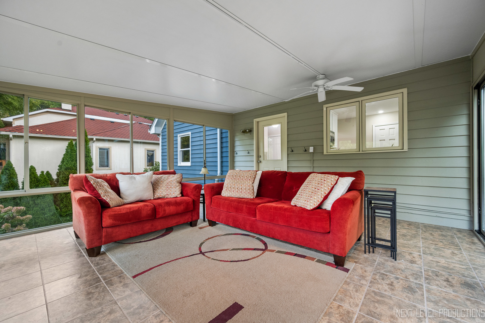 24 River Bend Road Montgomery, IL 60538 - Photo 20 of 36 a living room with furniture a rug and white walls