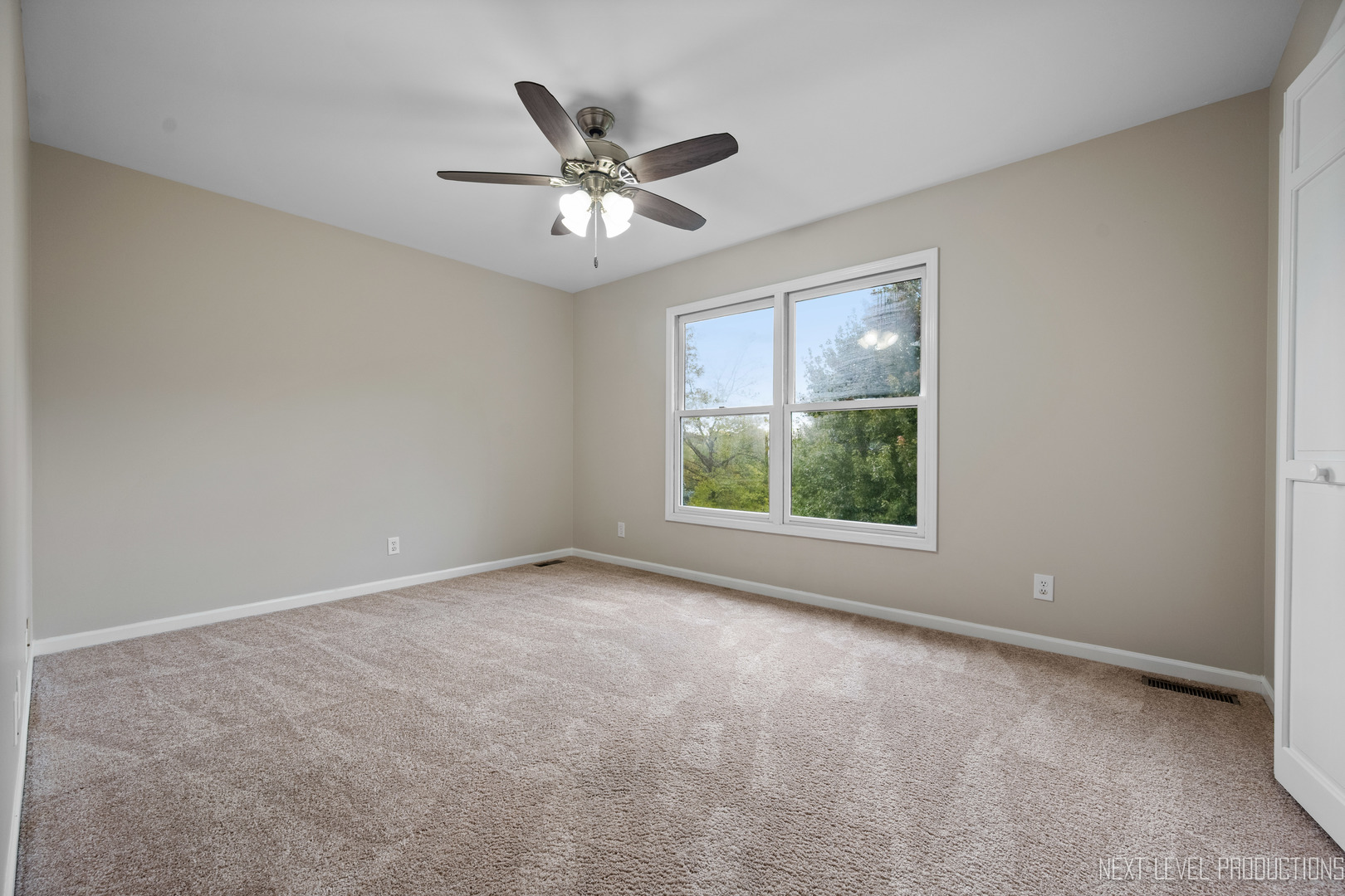 24 River Bend Road Montgomery, IL 60538 - Photo 28 of 36 an empty room with a window