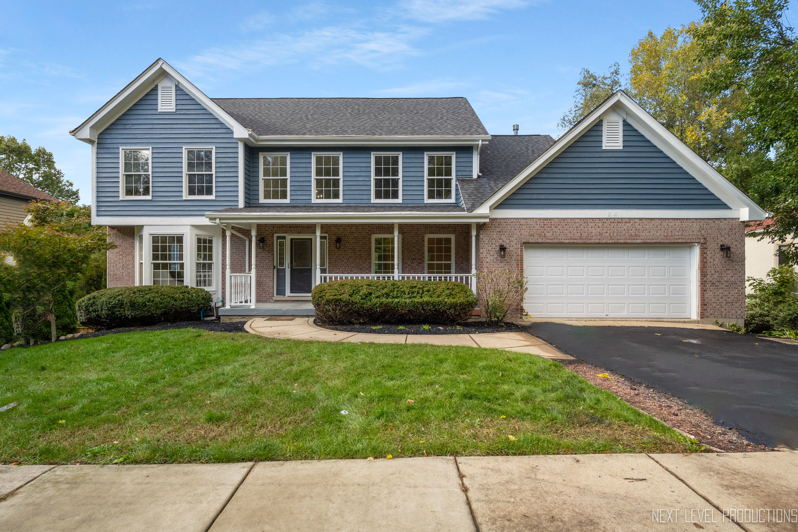 24 River Bend Road Montgomery, IL 60538 - Photo 3 of 36 front view of a house with a yard