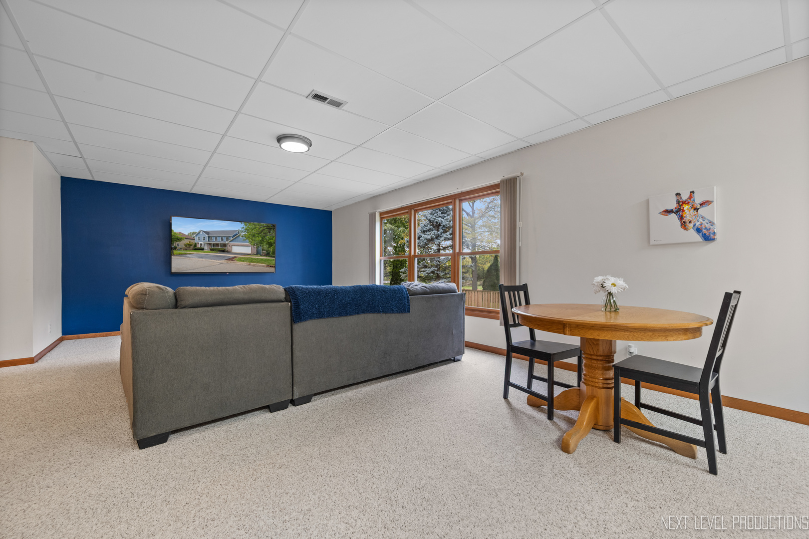 24 River Bend Road Montgomery, IL 60538 - Photo 31 of 36 a living room with furniture a table and a potted plant