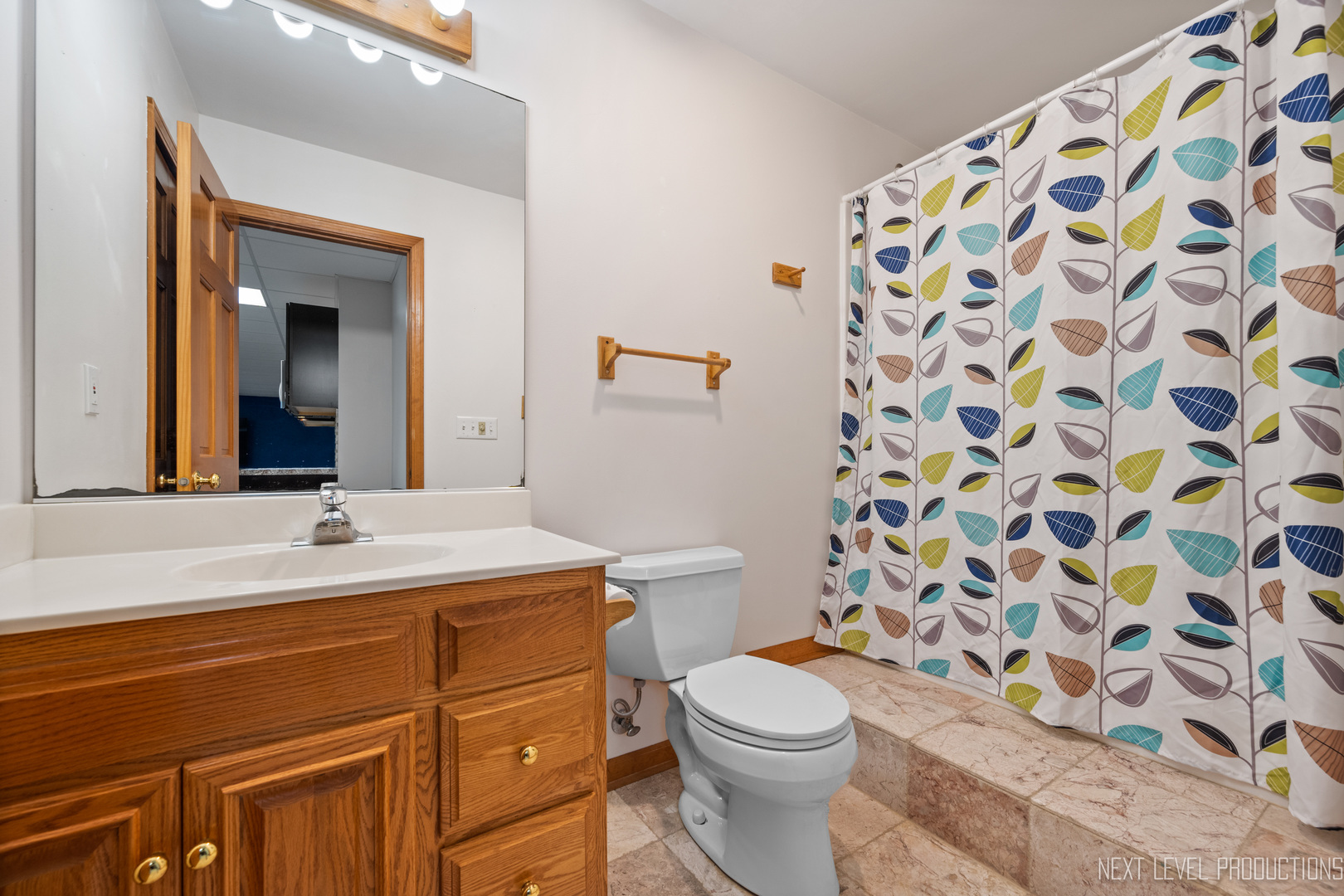 24 River Bend Road Montgomery, IL 60538 - Photo 33 of 36 a bathroom with a sink and a toilet