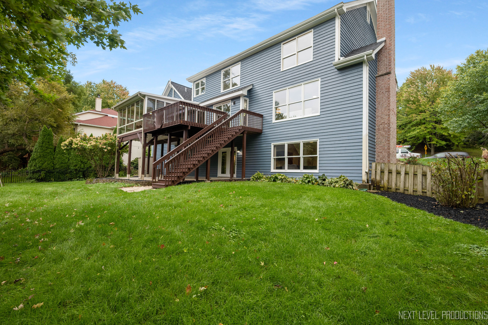 24 River Bend Road Montgomery, IL 60538 - Photo 34 of 36 a view of a house with backyard and porch