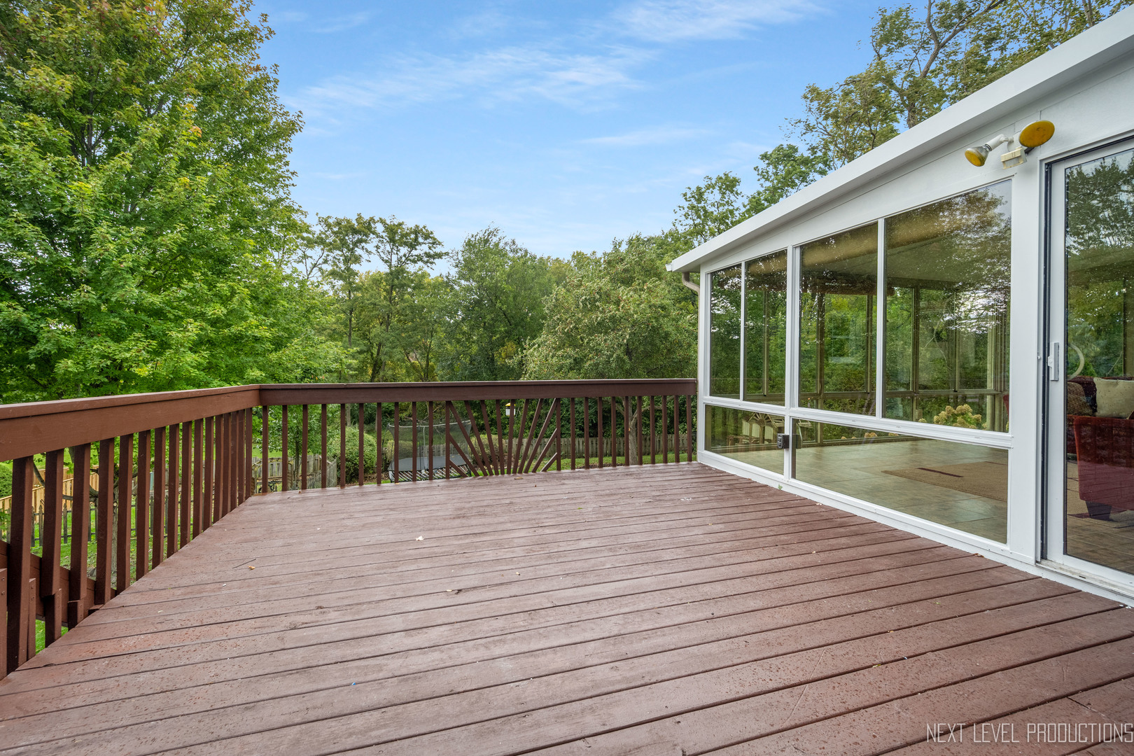 24 River Bend Road Montgomery, IL 60538 - Photo 36 of 36 a view of balcony with wooden floor and fence